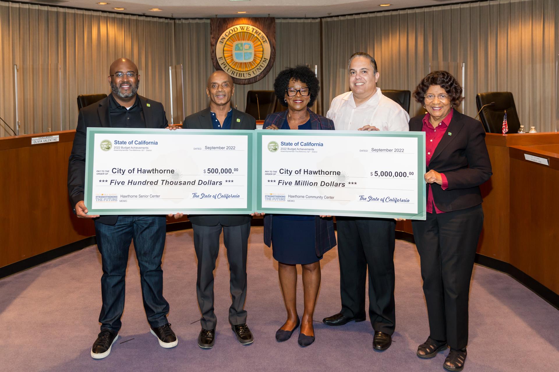 Council receiving checks from Assemblymember Tina McKinnor